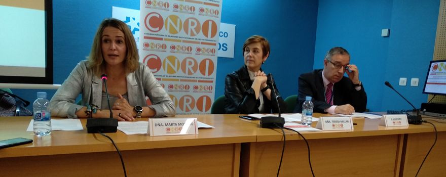 Marta Moreno, Teresa Millán y José Soto, durante la presentación del CNRI. 