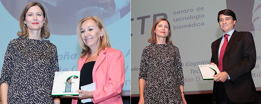 Carmen Ayuso, jefe de Servicio de Genética y  directora científica del Instituto de Investigación Sanitaria Fundación Jiménez Díaz, y Fernando Maestú, director del Laboratorio de Neurociencia Cognitiva y Computacional del Centro de Tecnología Biomédica de Madrid recogen el premio de manos de María Jesús Lamas. 